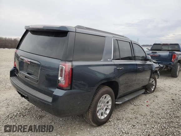 2020 GMC Yukon SLT with VIN 1GKS1BKC3LR259725, listed as a Copart auction lot 43036055 with 125,347 mi miles and Salvage Title. Bid and sale history available at DreamBid. Image 3.