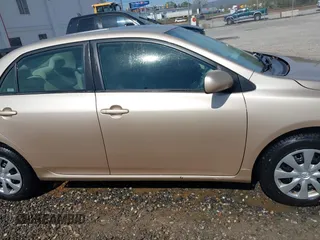 2011 Toyota Corolla L with VIN 2T1BU4EE1BC547635, listed as a IAAI auction lot 42053236 with 121,485 mi miles. Bid and sale history available at carsss.com. Image 13.