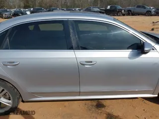 2012 Volkswagen Passat TDI SEL Premium with VIN 1VWCN7A31CC080506, listed as a IAAI auction lot 41792115 with 228,710 mi miles. Bid and sale history available at carsss.com. Image 13.