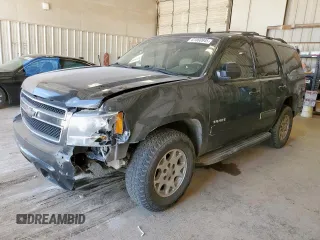 2011 Chevrolet Tahoe LS with VIN 1GNSCAE03BR124008, listed as a Copart auction lot 61060945 with 245,344 mi miles and Salvage title. Bid and sale history available at DreamBid. Image 1.