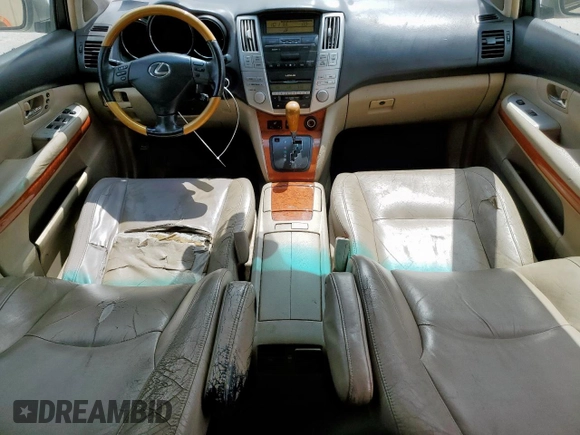2006 Lexus RX 400h with VIN JTJGW31U260004024, listed as a Copart auction lot 57281205 with 166,426 mi miles and Clean title. Bid and sale history available at DreamBid. Image 8.