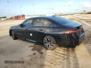 2024 BMW i5 M60 z VIN WBY43FK00RCP12947, wystawiony jako Copart lot #79117974 z przebiegiem Nie podano mil oraz Szkody całkowita. Historia ofert i sprzedaży dostępna na DreamBid. Obrazek 2.