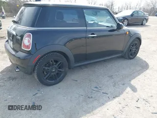 2013 MINI Hardtop with VIN WMWSU3C54DT684526, listed as a IAAI auction lot 42012211 with 141,801 mi miles and . Bid and sale history available at DreamBid. Image 4.