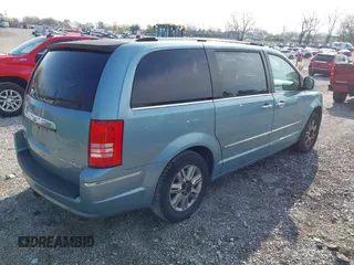2010 Chrysler Town & Country Limited with VIN 2A4RR6DX0AR237189, listed as a IAAI auction lot 41910606 with 169,317 mi miles. Bid and sale history available at carsss.com. Image 4.