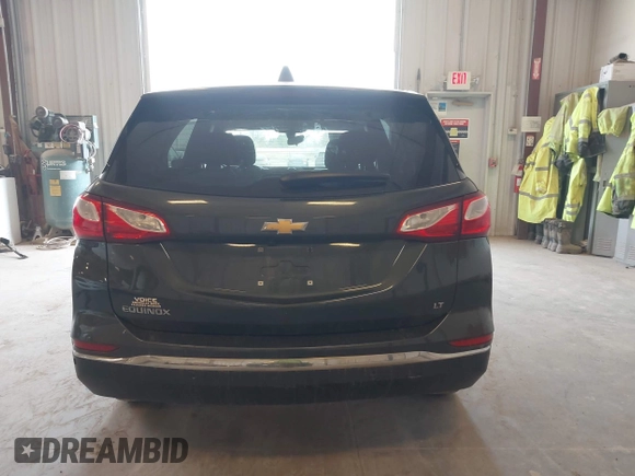 2018 Chevrolet Equinox LT z VIN 3GNAXJEV5JS569101, wystawiony jako IAAI lot #42055496 z przebiegiem 173 494 mil mil oraz . Historia ofert i sprzedaży dostępna na DreamBid. Obrazek 16.