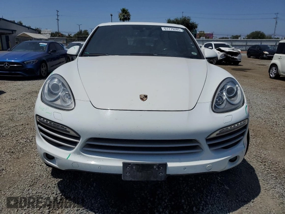 2014 Porsche Cayenne with VIN WP1AA2A28ELA09742, listed as a Copart auction lot 61779285 with 182,380 mi miles and Salvage title. Bid and sale history available at DreamBid. Image 5.