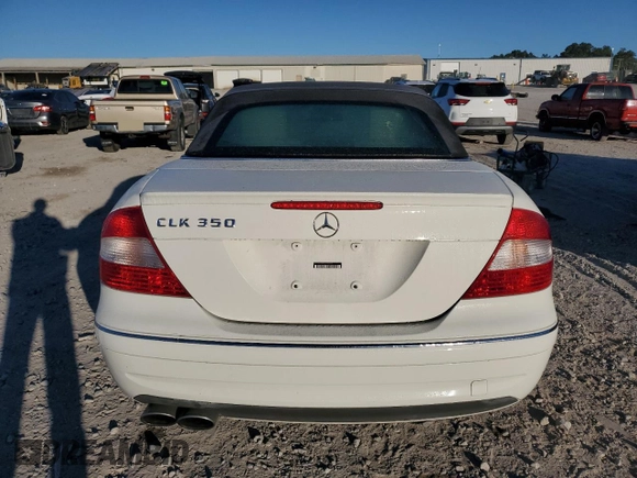2009 Mercedes-Benz CLK-Class 3.5L with VIN WDBTK56FX9T108328, listed as a Copart auction lot 74586884 with 49,660 mi miles and Salvage Title. Bid and sale history available at carsss.com. Image 6.