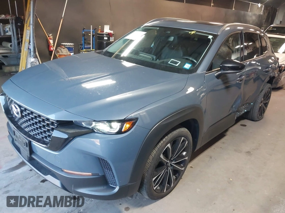 2023 Mazda CX-50 S Premium Plus with VIN 7MMVABEM3PN108555, listed as a IAAI auction lot 41202257 with 21,258 mi miles and . Bid and sale history available at DreamBid. Image 17.