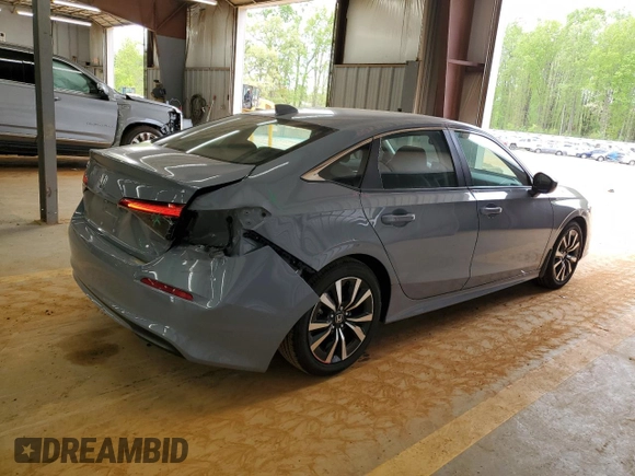 2024 Honda Civic EX z VIN 2HGFE1F78RH331974, wystawiony jako Copart lot #52220315 z przebiegiem 9 331 mil mil oraz Szkoda całkowita • Salvage title. Historia ofert i sprzedaży dostępna na DreamBid. Obrazek 3.