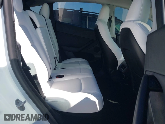 2024 Tesla Model Y with VIN 7SAYGDED9RF161420, listed as a IAAI auction lot 41892788 with 12,353 mi miles and . Bid and sale history available at DreamBid. Image 8.