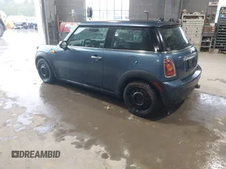 2009 MINI Hardtop with VIN WMWMF33569TU73595, listed as a IAAI auction lot 42229008 with 131,793 mi miles and . Bid and sale history available at DreamBid. Image 3.