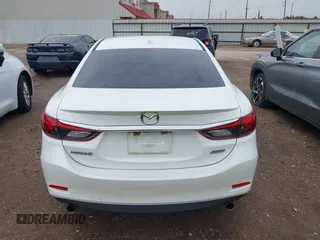 2016 Mazda 6 i Grand Touring with VIN JM1GJ1W54G1429179, listed as a IAAI auction lot 42117223 with 142,319 mi miles and . Bid and sale history available at DreamBid. Image 16.