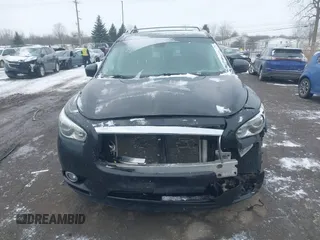 2015 Infiniti QX60 z VIN 5N1AL0MM7FC524175, wystawiony jako IAAI lot #41417720 z przebiegiem 124 622 mil mil oraz . Historia ofert i sprzedaży dostępna na DreamBid. Obrazek 12.