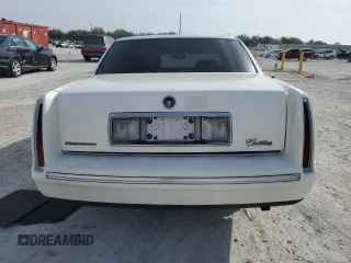 1998 Cadillac DeVille with VIN 1G6KD54Y7WU721351, listed as a Copart auction lot 42990425 with 98,666 mi miles and Salvage Title. Bid and sale history available at carsss.com. Image 6.