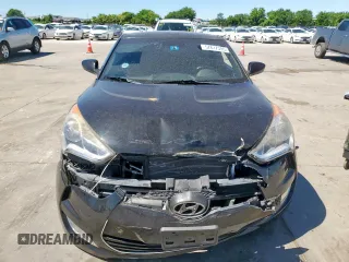 2016 Hyundai Veloster z VIN KMHTC6AD0GU266707, wystawiony jako Copart lot #57617395 z przebiegiem 70 677 mil mil oraz Szkoda całkowita • Salvage title. Historia ofert i sprzedaży dostępna na DreamBid. Obrazek 5.
