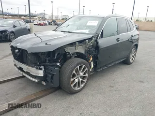 2022 BMW X5 xDrive45e with VIN 5UXTA6C08N9K85766, listed as a IAAI auction lot 41461039 with 95,003 mi miles. Bid and sale history available at carsss.com. Image 2.