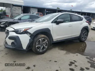 2024 Subaru Crosstrek Premium с VIN JF2GUADC5R8203155, выставлен на аукционе Copart как лот 50447065 с пробегом 63 192 миль миль и Списание • Salvage title. История ставок и продаж доступна на DreamBid. Изображение 1.