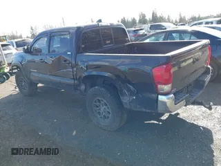 2017 Toyota Tacoma SR5 with VIN 5TFAZ5CN3HX040199, listed as a IAAI auction lot 41734051 with 107,665 mi miles and . Bid and sale history available at carsss.com. Image 3.