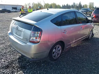 2005 Toyota Prius with VIN JTDKB20U853027020, listed as a IAAI auction lot 42084542 with 147,426 mi miles and . Bid and sale history available at DreamBid. Image 4.
