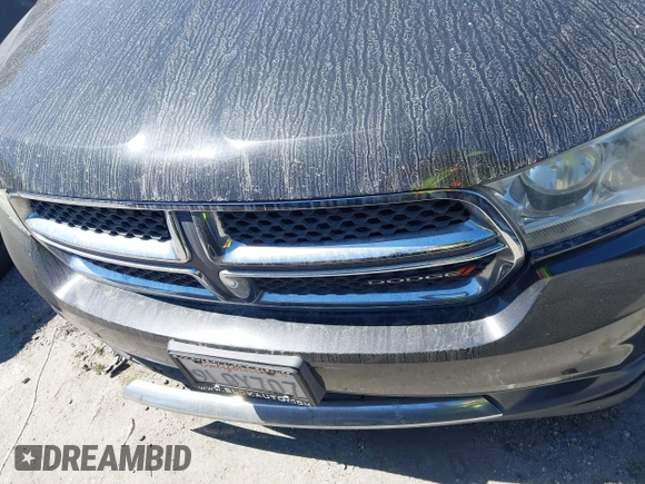 2013 Dodge Durango SXT with VIN 1C4RDHAG2DC673236, listed as a IAAI auction lot 42506024 with 198,215 mi miles and . Bid and sale history available at DreamBid. Image 12.