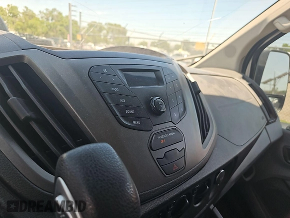 2016 Ford Transit Cargo with VIN 1FTYE1YM9GKB15650, listed as a IAAI auction lot 42679252 with 216,239 mi miles and . Bid and sale history available at DreamBid. Image 4.