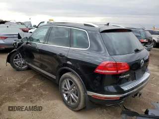 2016 Volkswagen Touareg Sport with VIN WVGEF9BP4GD011455, listed as a Copart auction lot 49734885 with 145,450 mi miles and Salvage Title. Bid and sale history available at DreamBid. Image 2.