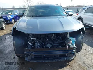 2020 Volkswagen Atlas SE z VIN 1V21E2CA9LC211835, wystawiony jako IAAI lot #41574645 z przebiegiem 50 586 mil mil oraz . Historia ofert i sprzedaży dostępna na DreamBid. Obrazek 13.