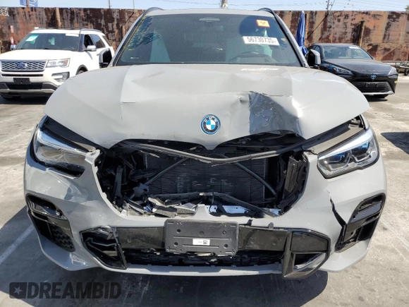 2023 BMW X5 xDrive45e with VIN 5UXTA6C0XP9P49482, listed as a Copart auction lot 56730735 with Not provided miles and Salvage title. Bid and sale history available at DreamBid. Image 5.