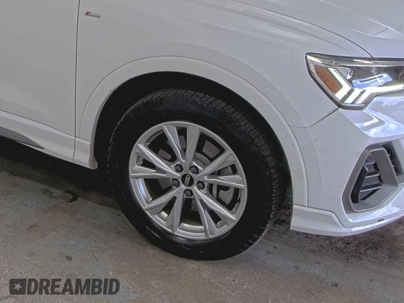 2023 Audi Q3 S line Premium with VIN WA1DECF37P1107583, listed as a IAAI auction lot 42708277 with 51,891 mi miles and . Bid and sale history available at DreamBid. Image 5.