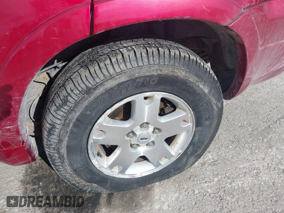2007 Ford Escape Limited with VIN 1FMCU94147KA24935, listed as a IAAI auction lot 41374921 with 111,512 mi miles. Bid and sale history available at carsss.com. Image 19.