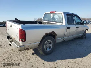 2004 Dodge Ram 1500 SLT with VIN 1D7HU18N04S715129, listed as a Copart auction lot 48259875 with 277,497 mi miles and Salvage Title. Bid and sale history available at carsss.com. Image 3.
