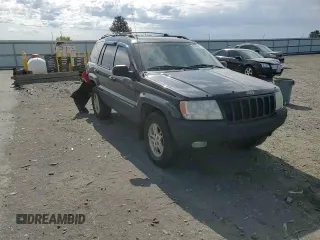 1999 Jeep Grand Cherokee Limited with VIN 1J4GW68N4XC679841, listed as a Copart auction lot 59760015 with 155,366 mi miles and Salvage title. Bid and sale history available at DreamBid. Image 14.