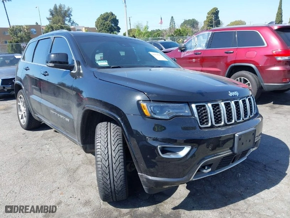 2018 Jeep Grand Cherokee Limited with VIN 1C4RJFBGXJC203561, listed as a IAAI auction lot 41670783 with 69,648 mi miles. Bid and sale history available at carsss.com. Image 1.