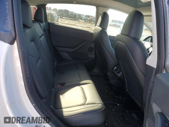 2022 Tesla Model Y Long Range z VIN 7SAYGDEE1NA009664, wystawiony jako Copart lot #41533925 z przebiegiem 36 126 mil mil oraz Szkody całkowita. Historia ofert i sprzedaży dostępna na DreamBid. Obrazek 11.