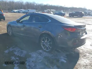 2014 Mazda 6 i Grand Touring with VIN JM1GJ1W67E1137886, listed as a IAAI auction lot 41405112 with 159,879 mi miles and . Bid and sale history available at DreamBid. Image 3.