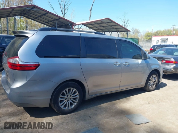 2015 Toyota Sienna XLE with VIN 5TDYK3DC0FS558486, listed as a IAAI auction lot 42064281 with 211,119 mi miles and . Bid and sale history available at DreamBid. Image 14.