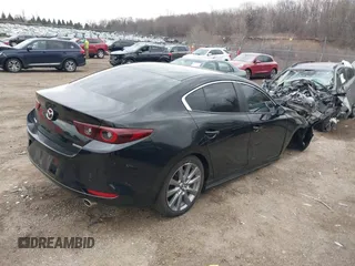 2023 Mazda 3 S Preferred with VIN 3MZBPACM2PM370346, listed as a IAAI auction lot 41835205 with 21,368 mi miles and . Bid and sale history available at DreamBid. Image 4.
