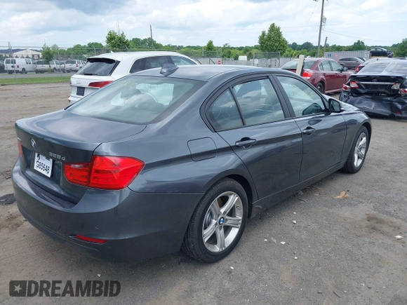 2014 BMW 3 Series 328d xDrive with VIN WBA3D5C56EKX99636, listed as a IAAI auction lot 42470800 with 109,050 mi miles and . Bid and sale history available at DreamBid. Image 4.