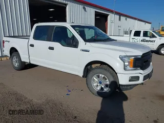 2018 Ford F-150 XL with VIN 1FTFW1E5XJFE79125, listed as a IAAI auction lot 42043296 with 165,003 mi miles. Bid and sale history available at carsss.com. Image 1.