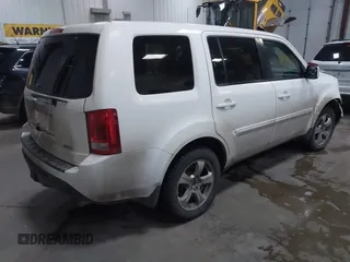 2015 Honda Pilot EX-L with VIN 5FNYF4H59FB023814, listed as a IAAI auction lot 41161235 with 216,437 mi miles and . Bid and sale history available at carsss.com. Image 4.