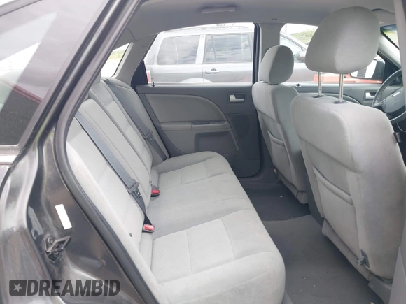 2007 Ford Five Hundred SEL z VIN 1FAHP24157G102902, wystawiony jako IAAI lot #42123329 z przebiegiem 105 468 mil mil oraz . Historia ofert i sprzedaży dostępna na DreamBid. Obrazek 8.