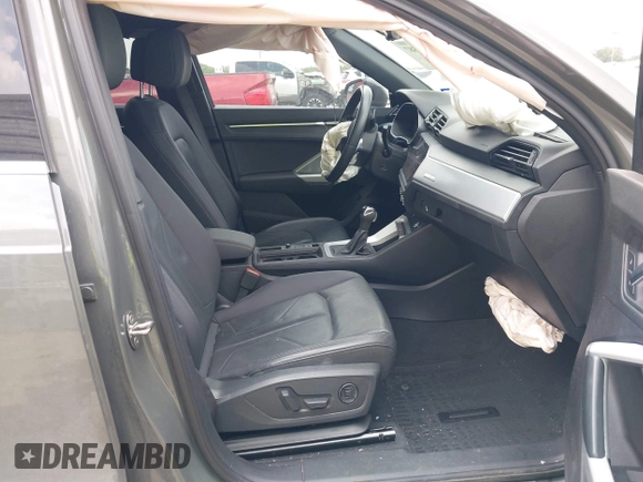 2021 Audi Q3 S line Premium z VIN WA1DECF33M1040282, wystawiony jako IAAI lot #42162587 z przebiegiem 90 509 mil mil oraz . Historia ofert i sprzedaży dostępna na DreamBid. Obrazek 5.