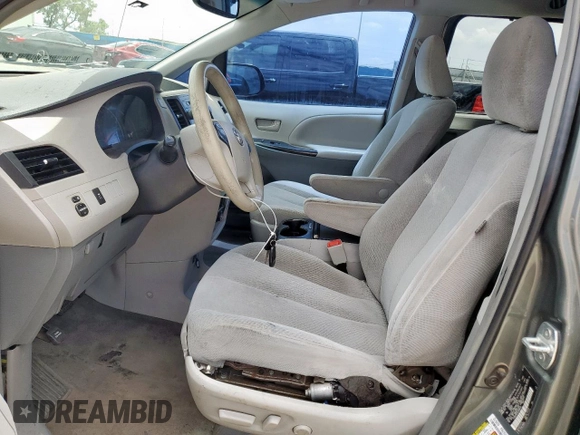 2014 Toyota Sienna LE AAS with VIN 5TDKK3DC4ES486440, listed as a Copart auction lot 62010355 with 401,453 mi miles and Salvage title. Bid and sale history available at DreamBid. Image 7.