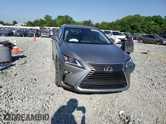 2019 Lexus RX 350 with VIN 2T2BZMCA8KC182934, listed as a Copart auction lot 55327195 with 65,746 mi miles and Salvage title. Bid and sale history available at DreamBid. Image 14.