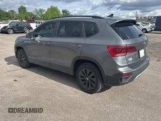 2022 Volkswagen Taos S z VIN 3VVCX7B29NM017370, wystawiony jako Copart lot #56599925 z przebiegiem 94 176 mil mil oraz Czysty tytuł • Clean title. Historia ofert i sprzedaży dostępna na DreamBid. Obrazek 3.