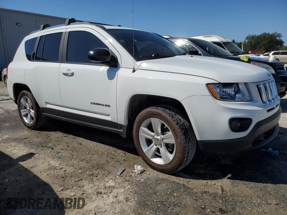 2012 Jeep Compass Sport with VIN 1C4NJCBA4CD605775, listed as a Copart auction lot 48559085 with 59,356 mi miles and Salvage Title. Bid and sale history available at carsss.com. Image 4.