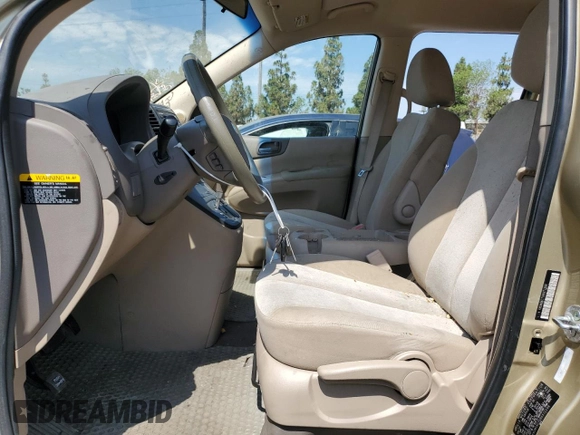 2011 Kia Sedona LX with VIN KNDMG4C75B6372298, listed as a Copart auction lot 62143844 with 180,287 mi miles and Salvage Title. Bid and sale history available at carsss.com. Image 7.