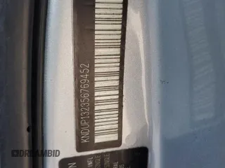 2005 Kia Sedona LX with VIN KNDUP132356769452, listed as a Copart auction lot 82835494 with 93,845 mi miles and Salvage Title. Bid and sale history available at carsss.com. Image 13.