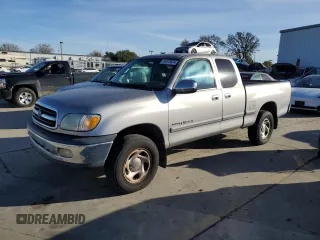 2001 Toyota Tundra SR5 with VIN 5TBRN34141S202716, listed as a Copart auction lot 86973674 with 213,593 mi miles and Clean Title. Bid and sale history available at DreamBid. Image 1.