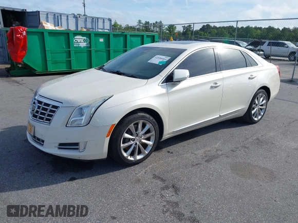 2013 Cadillac XTS Premium z VIN 2G61S5S35D9103948, wystawiony jako IAAI lot #42090444 z przebiegiem 154 728 mil mil oraz . Historia ofert i sprzedaży dostępna na DreamBid. Obrazek 2.